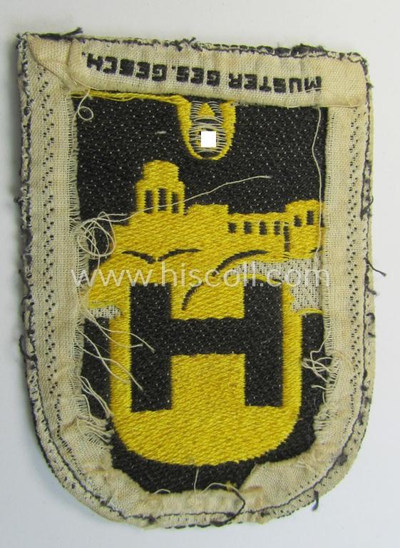 Superb - very unusual and only twice before encountered! - linnen-based- and/or: 'BeVo'-woven (smaller!) cloth-based sportshirt-patch depicting a capital: 'H' and 'U'-character as intended for usage by students of the: 'Universität Heidelberg'