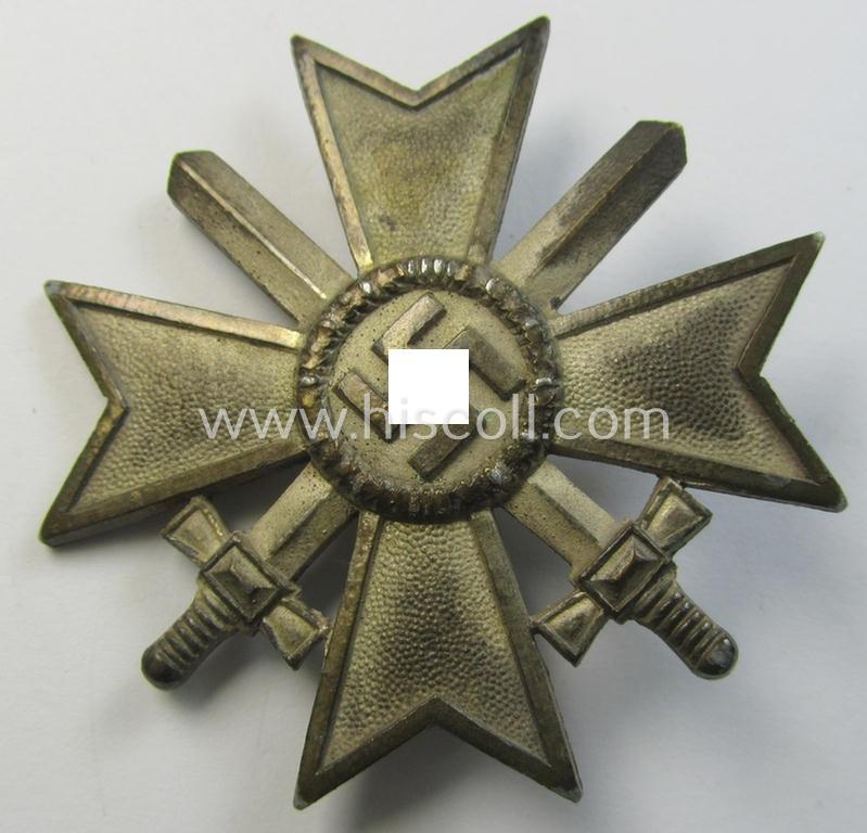 Attractive, 'Kriegsverdienstkreuz 1. Kl. mit Schwertern' being a maker- (ie. 'L15'-) marked and typical zinc- (ie. 'Feinzink'-) based specimen as was produced by the Austrian maker (ie. 'Hersteller'): 'Friedrich Orth'