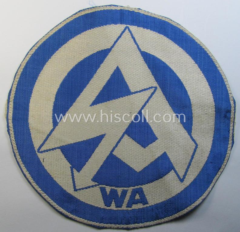 Attractive - and scarcely encountered! - SA (ie. 'Sturmabteilungen'), 'BeVo'-woven sport-shirt insignia still showing its period-attached 'RzM'-etiket as was intended for an SA-member who served within the: 'Gruppe Wartheland' (WA)