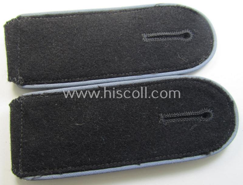 Attractive - and/or fully matching! - pair of Waffen-SS, enlisted-mens'-type shoulderstraps as piped in the light-blue-coloured branchcolour as was intended for usage by a soldier who served within the: 'Waffen-SS Nachschub-Truppen'