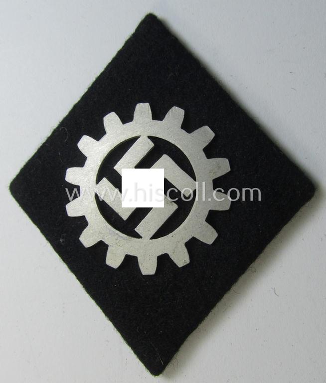 Attractive, bright-silver-toned- and/or: neatly aluminium-based, so-called: 'DAF' (ie. 'Deutsche Arbeitsfront'): 'Werkschar-Raute' (being a very detailed example that still shows its period-attached 'RzM'-etiket)