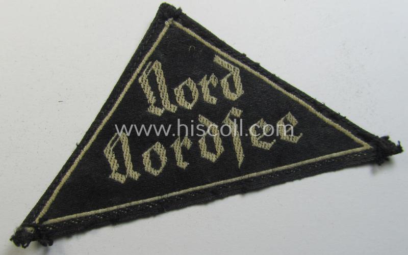 'HJ' ('Hitlerjugend') ie. 'BDM' ('Bund Deutscher Mädel'-) district-triangle (ie. 'Gebietsdreieck') entitled: 'Nord Nordsee' being a moderately used- ie. worn example that misses its paper-based 'RzM'-etiket