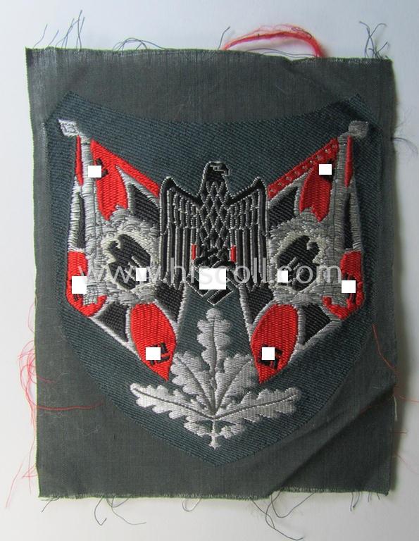 Superb - and scarcely encountered! - WH (Heeres), flat-wire- (ie. 'BeVo'-) woven 'Ärmelabzeichen für Fahnenträger des Heeres' as was intended for a soldier (ie. NCO) who served within a: '(Sturm)Artillerie'-unit