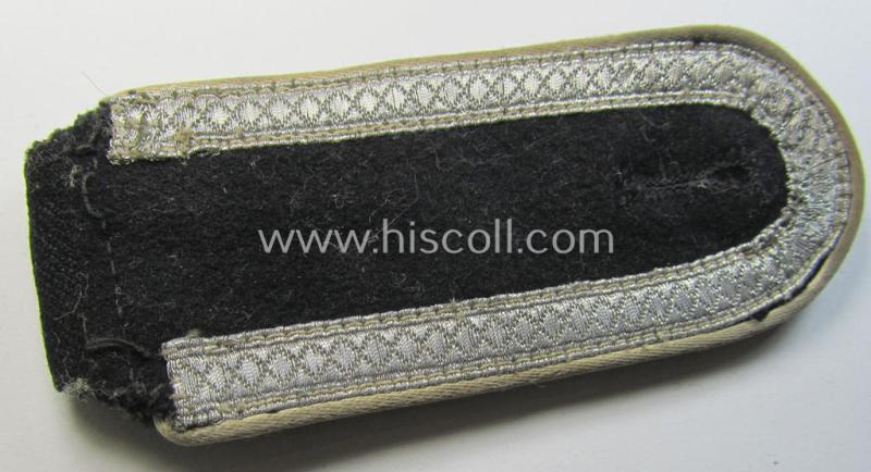 Superb - albeit regrettably single! - Waffen-SS NCO-type shoulderstrap as piped in the white-coloured branchcolour as was intended for usage by an: 'SS-Unterscharführer' who served within the: 'Waffen-SS Infanterie-Truppen'