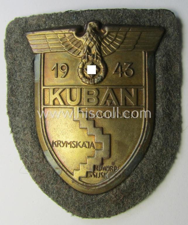Very attractive - and actually scarcely encountered! - WH (Heeres ie. Waffen-SS) 'Kuban'-campaign-shield that comes mounted onto its original field-grey-coloured- and/or woolen-based 'backing'