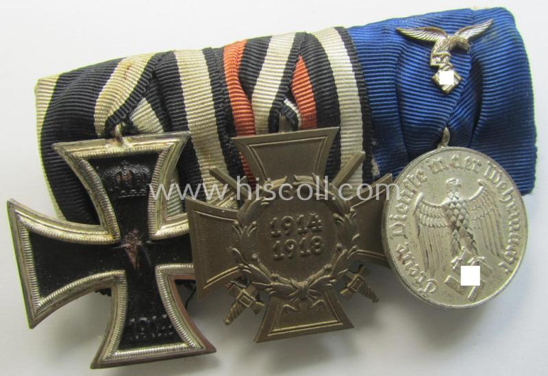 Attractive, WWI- (ie. TR-) period so-called: 'Ordenspange' (being of the non-'detachable-pattern') showing resp. an: 'EK II. Kl.'. a: 'FKK 1914-18 mit Schw.' and a: WH (Luftwaffe) 'DA der 4. Stufe'
