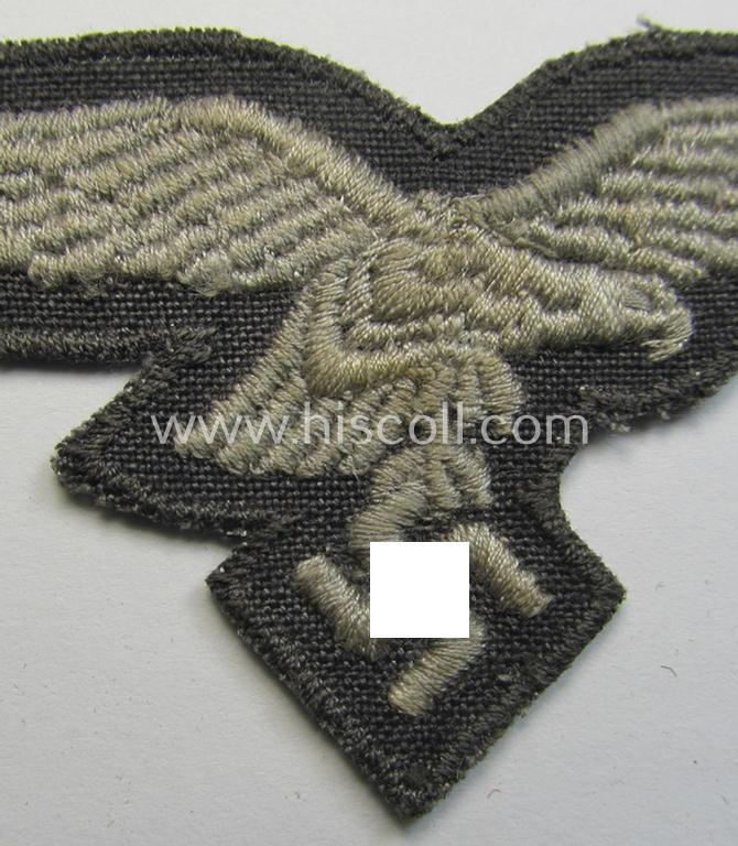 Neat, 'variant'-pattern, WH (Luftwaffe) EM- (ie. eventually NCO-) type side-cap eagle (being a 'virtually mint- ie. unissued' example as executed in typical machine-embroidered-pattern onto an unusally seen 'thin-shaped' background)
