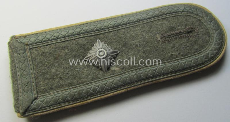 Single, WH (Heeres) NCO-type (ie. 'M40'- ie. 'M43'-pattern) shoulderstrap having the white-coloured branchcolour as was intended for - and clearly worn by! - a: 'Feldwebel der Infanterie-Truppen'