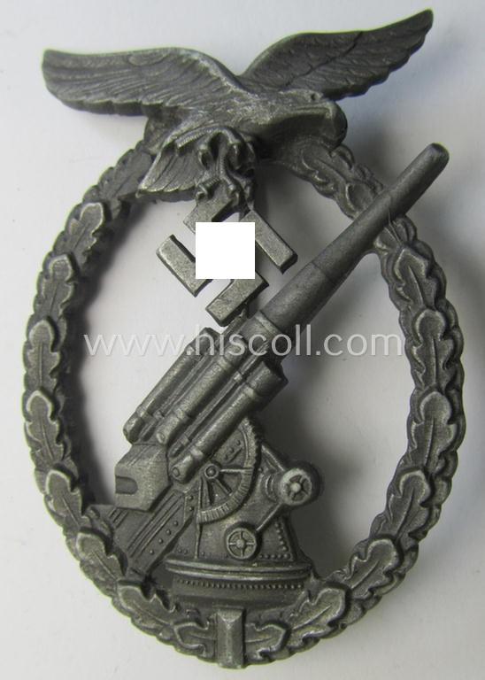 Attractive - and just moderately used! - 'Feinzink'-based example of a WH (Luftwaffe) 'Flakkampfabzeichen' being a very detailed albeit non-maker-marked example as was produced by the: 'Steinhauer & Lück'-company