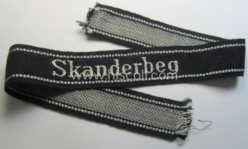 Superb - and rarely encountered! - example of a Waffen-SS, 'semi-BeVo'-pattern, EM- (ie. NCO-) type cuff-title (ie. 'Ärmelstreifen') as was intended for a member of the: '21. Waffen-Grenadier-Division der SS' “Skanderbeg” (ie. 'albanische Nr. 1')