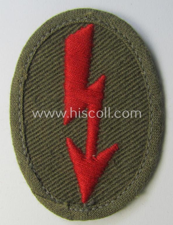 WH (Heeres) 'tropical-styled', trade- and/or special-career insignia (or: 'Signal Blitz') as was intended for a soldier who served within the: 'Artillerie-Truppen'