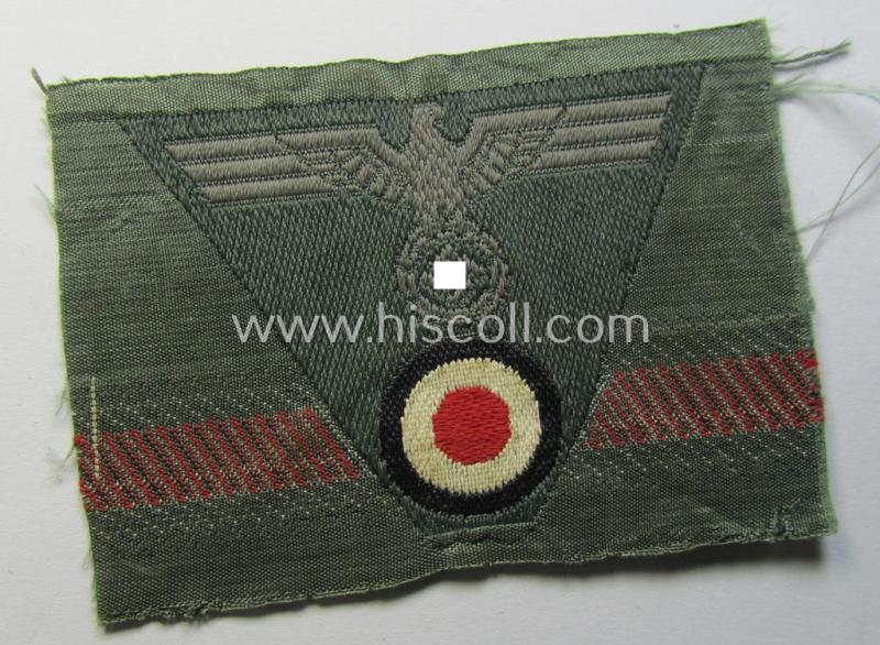 WH (Heeres) so-called: 'M43-pattern') cap-eagle/cocarde (ie. cap-trapezoid) as was specifically produced for usage on the so-called: 'M-43'-model field-caps (ie. 'Einheitsfeldmützen')