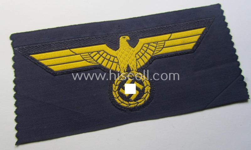 WH (Kriegsmarine) breast-eagle (ie. 'Brustadler für Mannschaften u. Uffz. der Kriegsmarine-Truppen') being a 'standard-pattern-example as executed in the 'BeVo'-weave-pattern on a darker-blue-coloured background