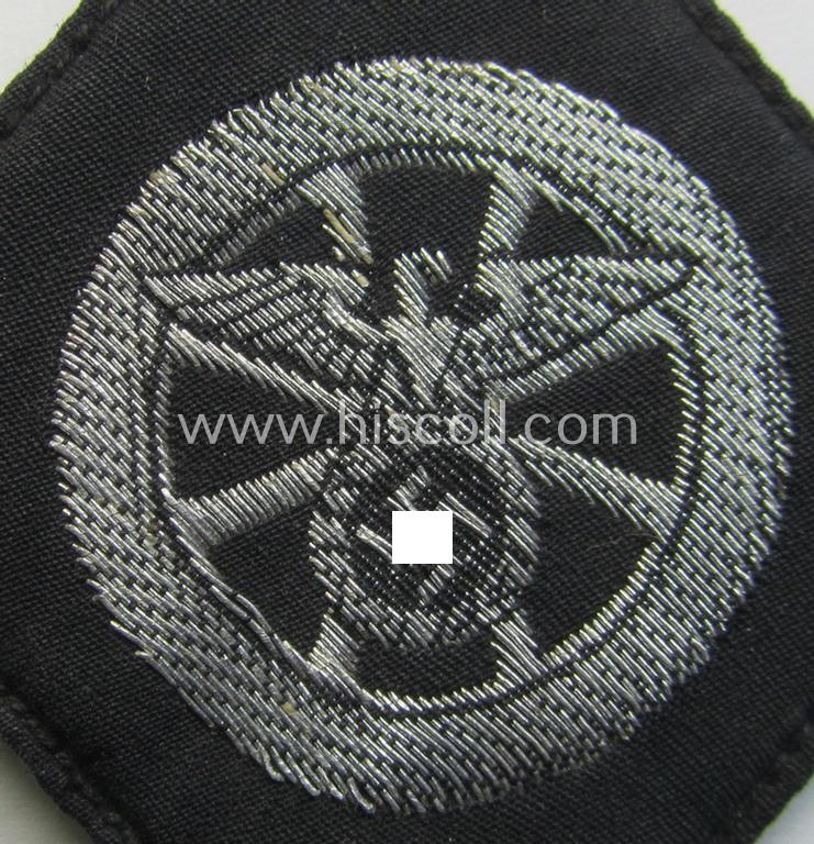 Attractive, N.S.K.K. (or: 'National Socialistisches Kraftfahr Korps') so-called: 'Kraftfahrraute des 1. Model' (or: 'drivers'-diamond' of the first pattern) that still retains its 'RZM'-etiket and that comes in an overall very nice condition