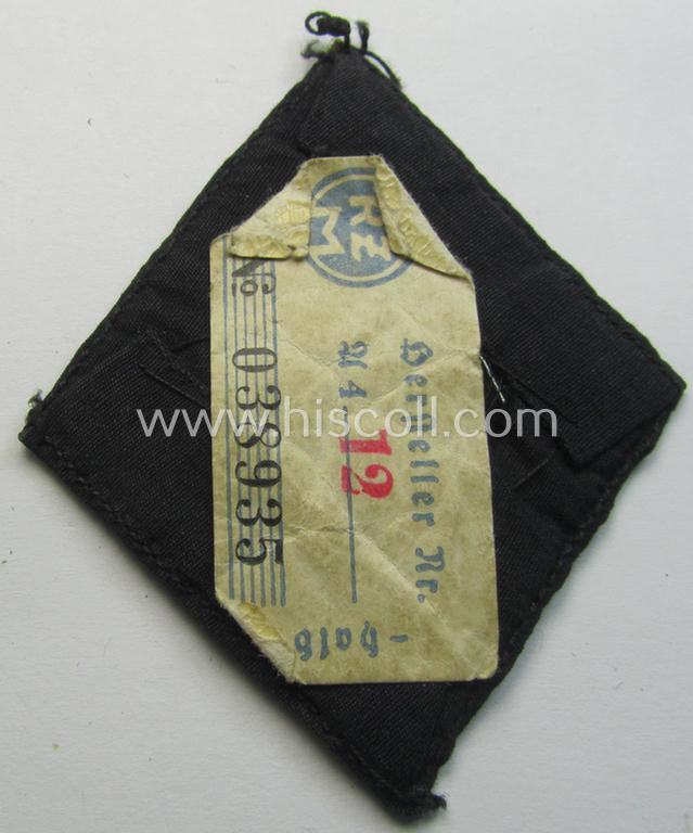 Attractive, N.S.K.K. (or: 'National Socialistisches Kraftfahr Korps') so-called: 'Kraftfahrraute des 1. Model' (or: 'drivers'-diamond' of the first pattern) that still retains its 'RZM'-etiket and that comes in an overall very nice condition