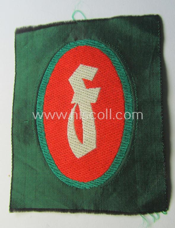 Attractive, 'Sicherheits- u. Hilfsdienst (SHD)' armbadge (ie. 'Ärmelabzeichen') as executed in 'BeVo'-weave pattern, as was intended for an SHD-member who served within the: 'Feuerlöschdienst' (or: fire-extinction-service)