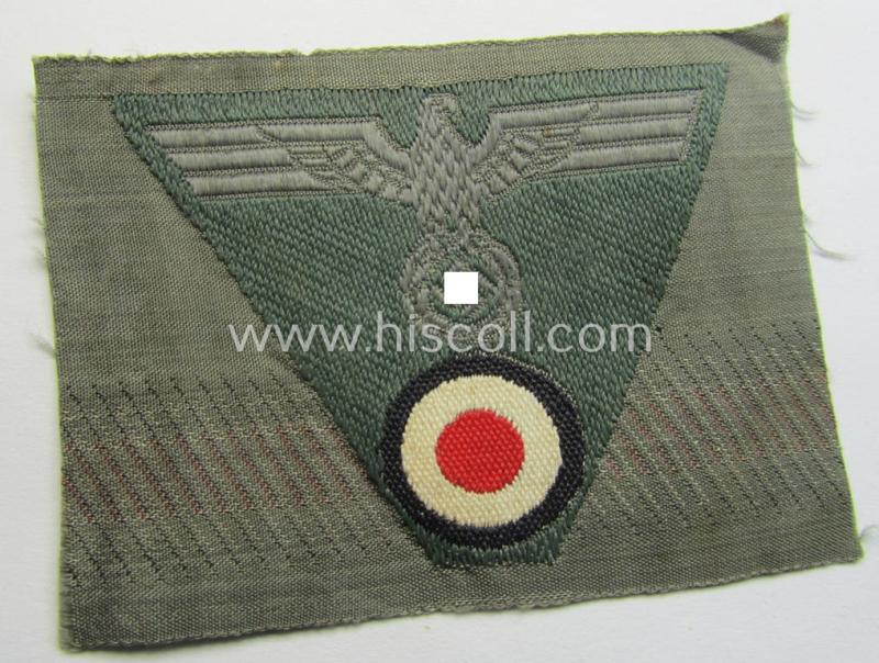 WH (Heeres) so-called: 'M43-pattern') cap-eagle/cocarde (ie. cap-trapezoid) as was specifically produced for usage on the so-called: 'M-43'-model field-caps (ie. 'Einheitsfeldmützen')