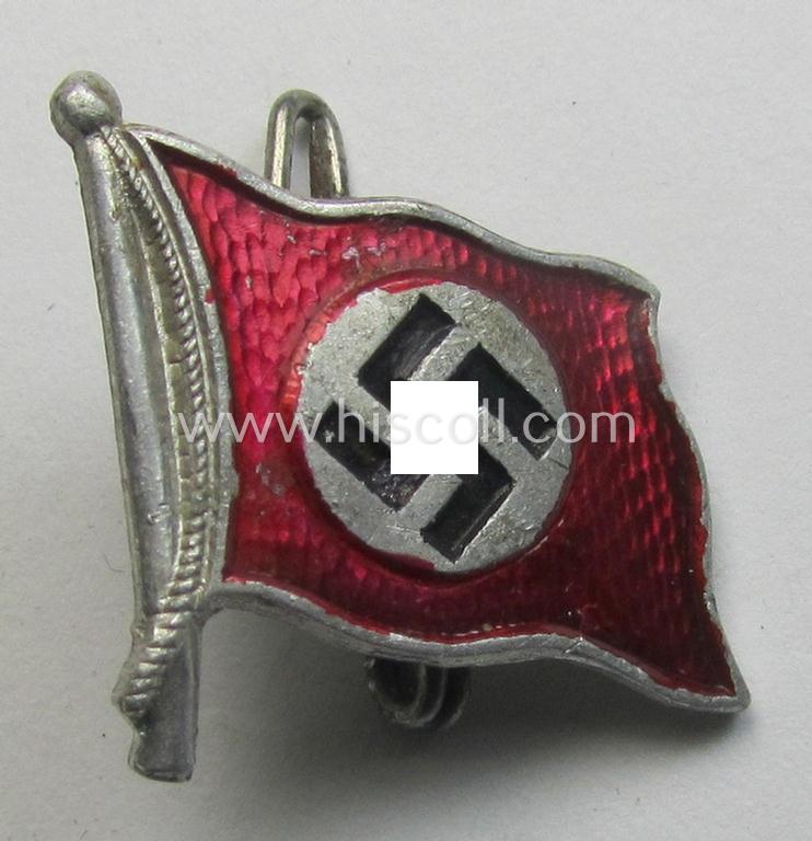Commemorative - and not that often seen! - (I deem) quite early-period, aluminium-based, N.S.D.A.P.-related lapel-pin example depicting a swastika-flag being a maker- (ie. 'Carl Wild'-) marked example
