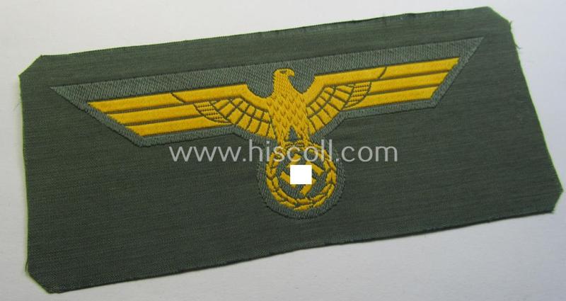 WH (Kriegsmarine) ie. 'Küst.-Art.'-related breast-eagle (ie. 'Brustadler für Mannschaften u. Uffz. der Küsten-Artillerie-Truppen') being a 'standard-issue'-pattern-example as executed in the 'BeVo'-weave-pattern on a field-grey-coloured background