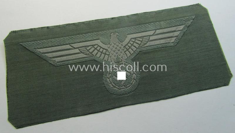 WH (Heeres) related breast-eagle (ie. 'Brustadler für Mannschaften u. Uffz. des Heeres') being a 'standard-issue'-pattern-example as executed in the 'BeVo'-weave-pattern on a field-grey-coloured background