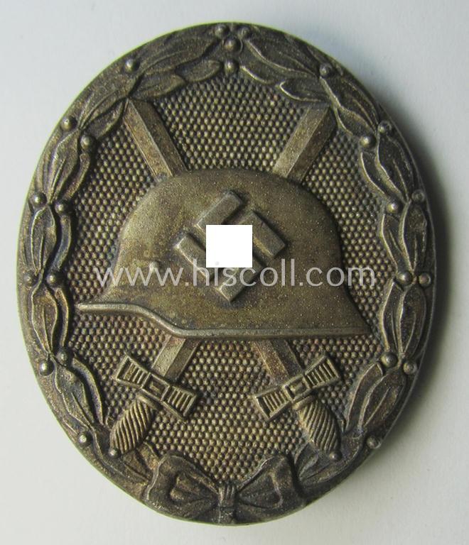 Attractive - and moderately used- and worn! - example of a maker- (ie. '65'-) marked example of a silver-class wound-badge (or: 'Verwundeten-Abzeichen in Silber') as was produced by the 'Hersteller' ie. maker: 'Klein u. Quenzer'