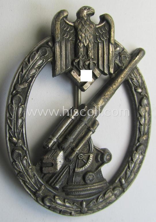 Superb - albeit regrettably incomplete! - 'Heeres-Flakkampf-Abzeichen' being a typical maker- (ie. 'Juncker'-) marked- and/or silvered 'Feinzink'-based specimen as was produced by the maker (ie. 'Hersteller') named: 'C.E. Juncker - Berlin SW68'