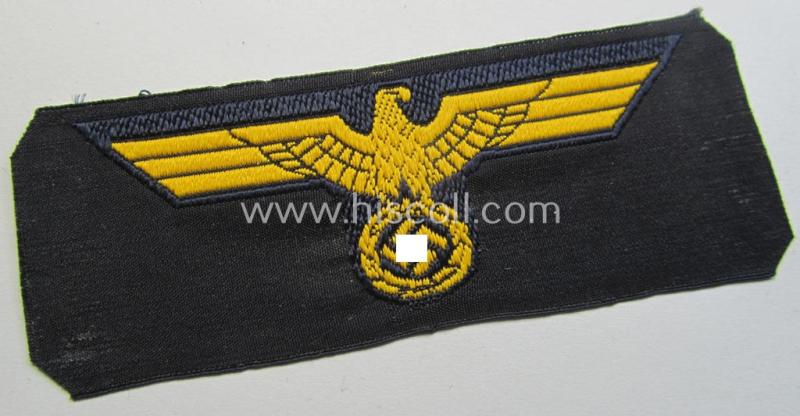 WH (Kriegsmarine) early- (ie. mid-war-) period- and/or golden-yellow-coloured WH (KM) type side-cap-eagle as executed in the neat 'BeVo'-weave pattern onto a darker-blue-coloured background