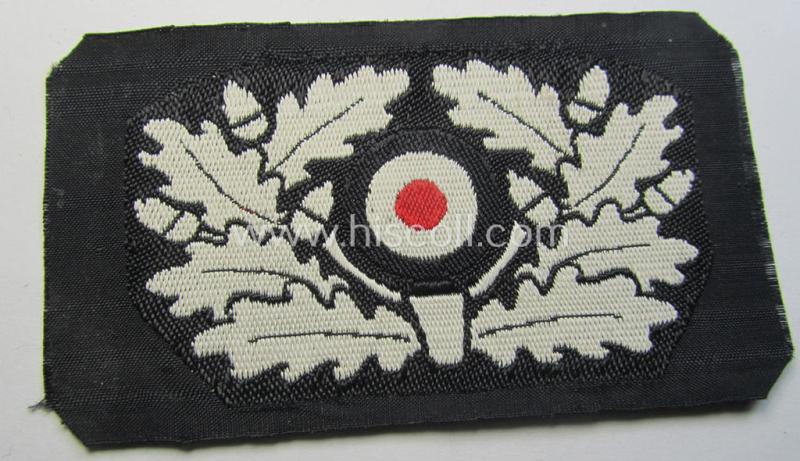 Attractive - and actually not that easily encountered! - early-pattern, WH (Heeres) specific cocarde as executed in white-coloured linnen in the so-called: 'BeVo'-weave as was intended for usage on the: 'Pz'-beret (ie. 'Panzerschutzmütze')