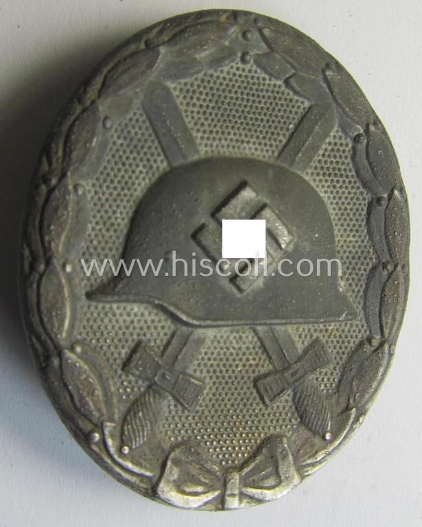 Attractive - and just moderately used- and worn! - example of a non-maker-marked and typical zinc (ie. 'Feinzink'-) based example of a silver-class wound-badge (or: 'Verwundeten-Abzeichen in Silber')