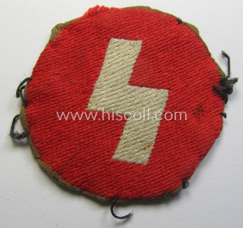 DJ (ie. 'Deutsches Jungvolk') arm-badge as was specifically intended for usage by a member who served within the: 'Oberbann 1' (being a moderately used- and carefully shirt-removed example that is void of an 'RzM'-etiket)