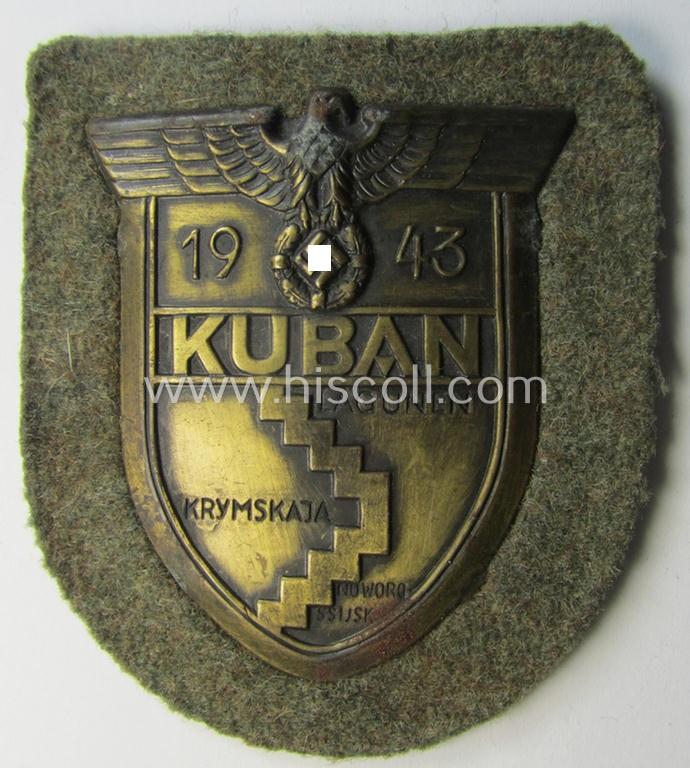 Very attractive - and actually scarcely encountered! - WH (Heeres ie. Waffen-SS) 'Kuban'-campaign-shield that comes mounted onto its original field-grey-coloured- and/or woolen-based 'backing'