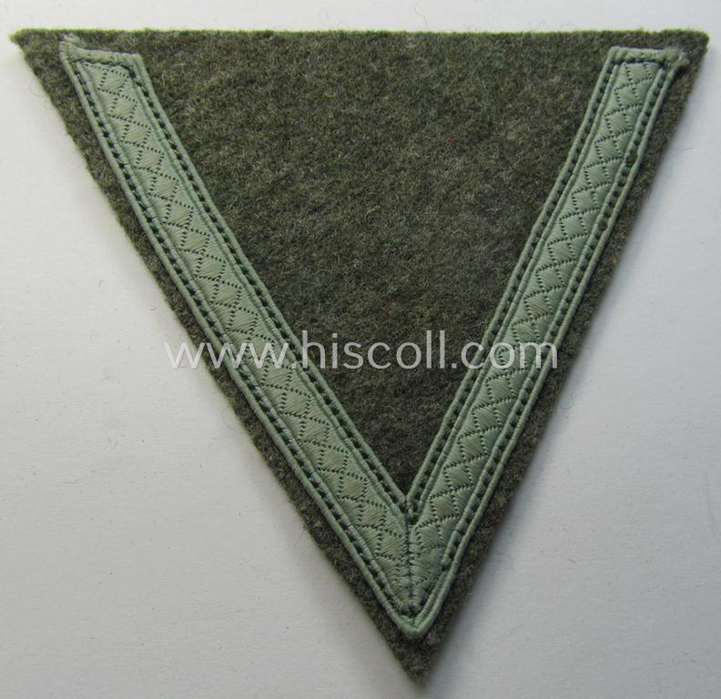WH (Heeres) 'Armwinkel' (or: arm-chevron) as executed on typical field-grey-coloured wool as was specifically intended for usage by a soldier with the rank of: 'Gefreiter'