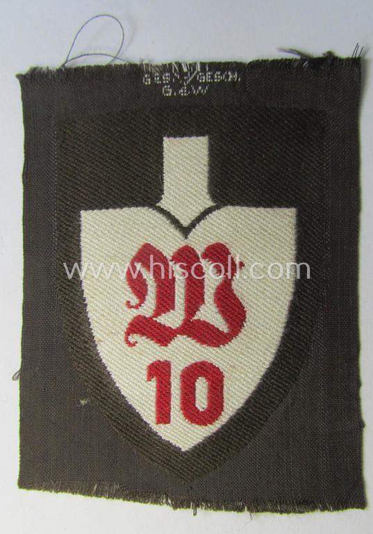Attractive - unusally brownish-toned and rarely encountered! - EM- (ie. NCO-) pattern, so-called: RAD (ie. 'Reichsarbeitsdienst') sleeve-badge (or: 'Dienststellenabzeichen') bearing the (to date unidentified!) specialist-designation: 'W 10'