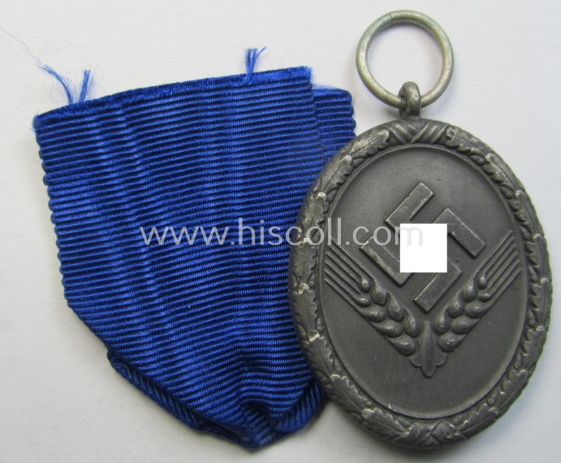 Attractive example of a: 'Reichsarbeitsdienst der weiblichen Jugend' (or: RADwJ) so-called: 'Dienstauszeichnung 3. Stf. in Silber' that comes mounted onto its period (broad-sized) ribbon (ie. 'Bandabschnitt')