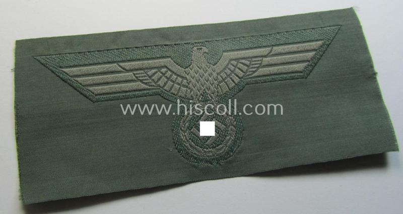 WH (Heeres) related breast-eagle (ie. 'Brustadler für Mannschaften u. Uffz. des Heeres') being a 'standard-issue'-pattern-example as executed in the 'BeVo'-weave-pattern on a field-grey-coloured background