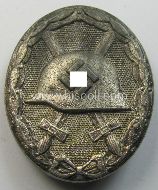 Neat, silver-class woundbadge (or: 'Verwundeten Abzeichen in Silber') being a nicely maker- (ie. '107'-) marked example (as was produced by the desirable 'Hersteller' ie. maker: 'Carl Wild')