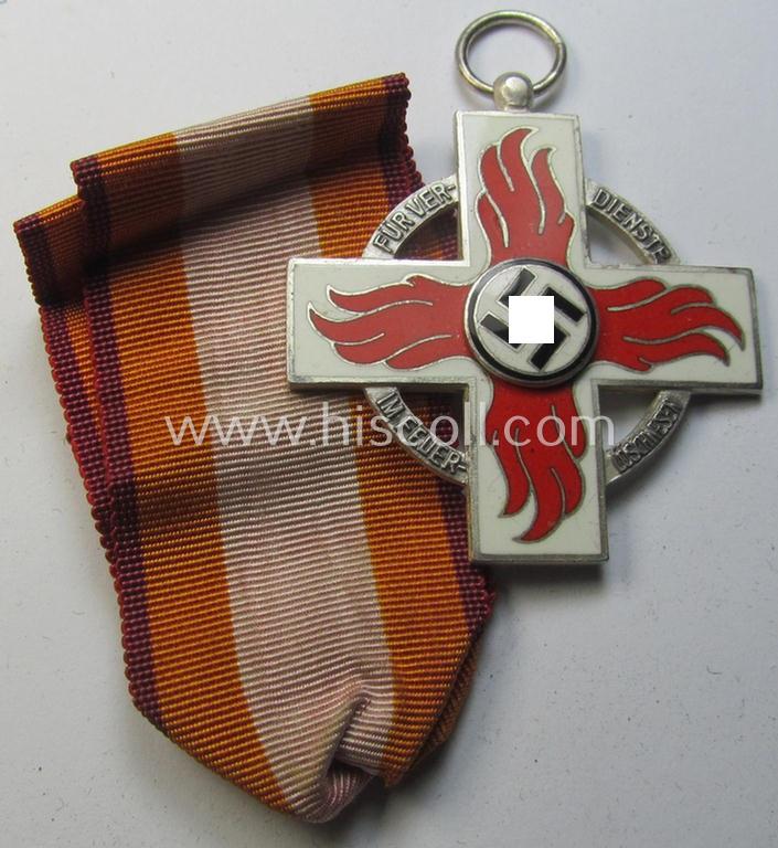 Superb - and actually scarcely encountered! - nicely enamelled, so-called: 'Feuerwehr-Ehrenzeichen der II. Stufe' that comes mounted onto its full-length piece of ribbon (ie. 'Bandabschnitt') as issued ie. worn