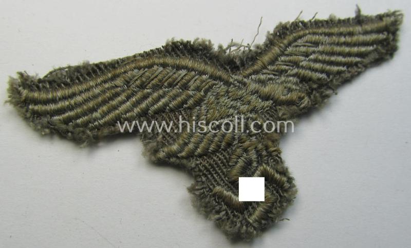 Neat, 'variant'-pattern, WH (Luftwaffe) EM- (ie. eventually NCO-) type side-cap eagle (being a truly used and/or cap-removed example as executed in typical machine-embroidered-pattern onto an unusally seen 'linnen-based' background)