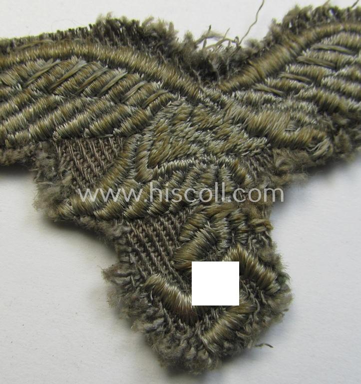 Neat, 'variant'-pattern, WH (Luftwaffe) EM- (ie. eventually NCO-) type side-cap eagle (being a truly used and/or cap-removed example as executed in typical machine-embroidered-pattern onto an unusally seen 'linnen-based' background)
