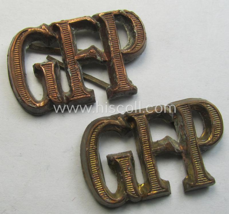 Neat - and matching! - pair of reddish-bronze-toned, WH (Heeres) shoulderboard-cyphers (ie. 'Schulterstück-Auflagen') depicting the 'GFP'-characters (as intended for an official ie. officer who served within the notorious: 'Geheime Feldpolizei'