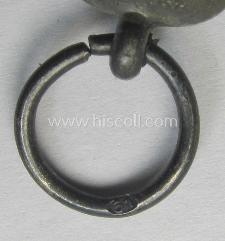 Attractive medal-set: 'Winterschlacht im Osten 1941-42' being a maker- (ie. '61'-) marked- (and/or 'Feinzink'-based) specimen by the maker: 'R.A. Karneth & Söhne' and that comes together with its (non-confectioned) ribbon (ie. 'Bandabschnitt')