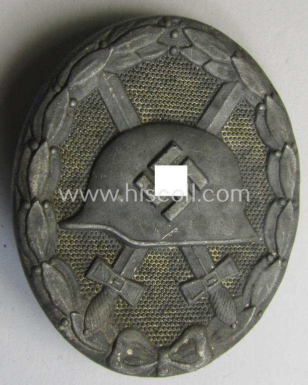 Attractive - and just moderately used- and worn! - example of a non-maker-marked and typical zinc (ie. 'Feinzink'-) based example of a silver-class wound-badge (or: 'Verwundeten-Abzeichen in Silber')