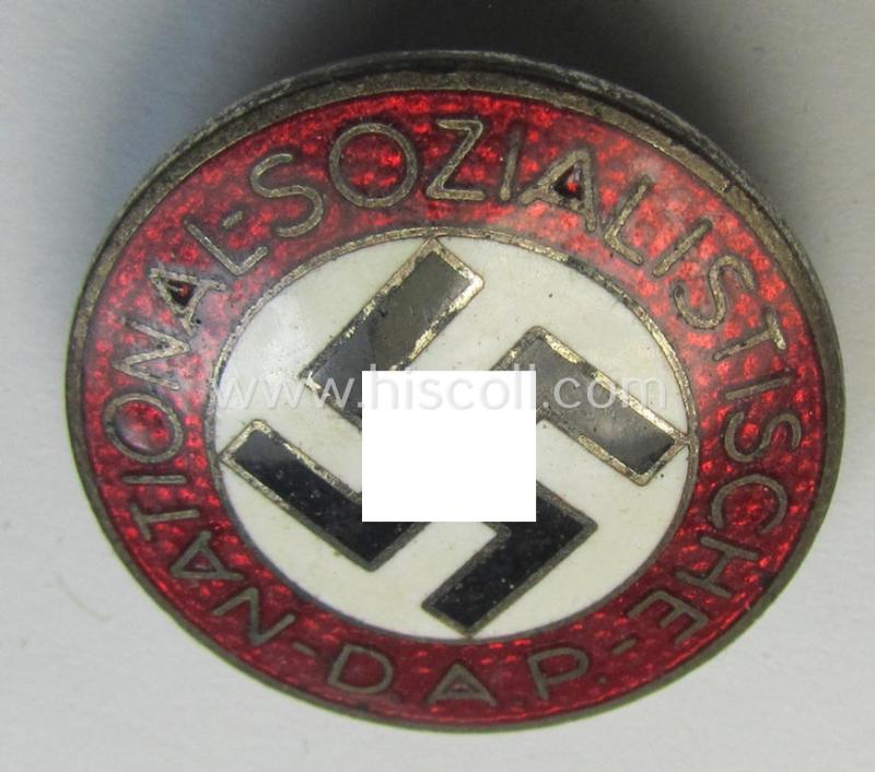 Neat - bright-red-coloured and nicely preserved! - 'N.S.D.A.P.'-membership-pin- ie. party-badge (or: 'Parteiabzeichen') which is maker-marked on its back with the makers'-designation: 'RzM' and/or: 'M1/42'