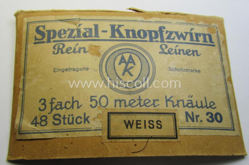 Neat, spare- or soldiers' personal-equipment-item: an unused roll of WH-period stitching-thread holding 50 mtrs. of white-coloured linnen named: 'Spezial Knofzwirn Nr. 30' as was produced by a company named: 'AAK'
