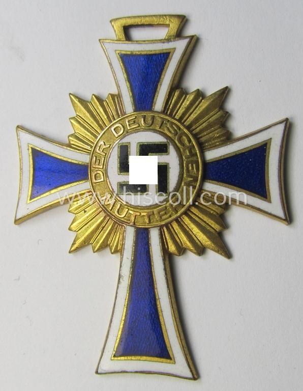 Superb, 'Ehrenkreuz der deutschen Mutter - erste Stufe' (or: golden-class mothers'-cross) being a 'virtually mint' example that comes with its accompanying, long-sized- (and also 'mint'!) ribbon as issued and/or recently found