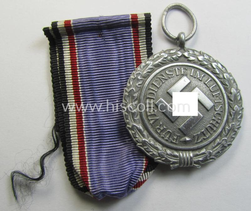 Atttractive, 'Luftschutz-Ehrenzeichen 2. Stufe' being a maker- (ie. '10'-) marked example as executed in zinc-based metal (ie. 'Feinzink') as was produced by the maker: 'Foerster & Barth'