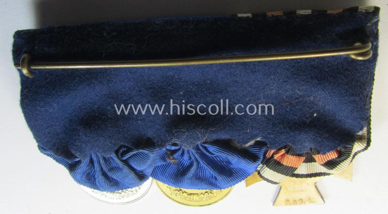 Attractive, 3-pieced medal-bar (ie. 'Ordenspange') showing resp. a WWI-period: 'FKK 1914-18 ohne Schw.' and two WWII-period: WH (Heeres or KM) so-called: 'Dienstauszeichnungen für 4 u. 12 Jahre Treue Dienste'