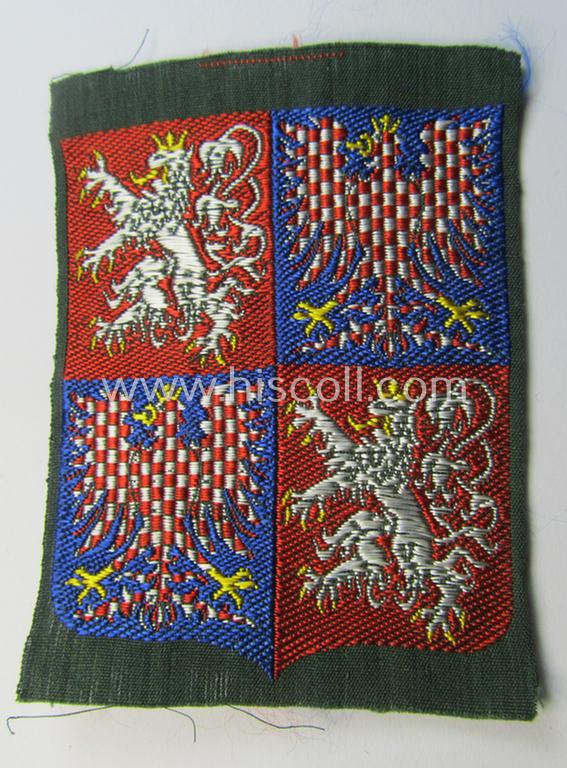 Colourful and neatly 'BeVo'-woven armshield as was specifically intended for a volunteer who served within the: 'Luftschutzpolizei Böhmen-Mähren' (as situated in the: 'Protektorat Böhmen-Mähren')