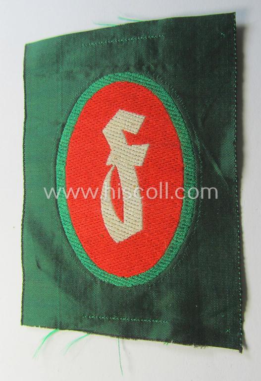 Attractive, 'Sicherheits- u. Hilfsdienst (SHD)' armbadge (ie. 'Ärmelabzeichen') as executed in 'BeVo'-weave pattern, as was intended for an SHD-member who served within the: 'Feuerlöschdienst' (or: fire-extinction-service)