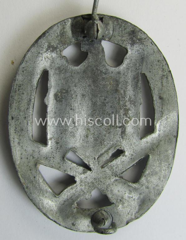 'Allgemeines Sturmabzeichen' (or: General Assault Badge ie. GAB) being a typical unmarked, zinc-based- (ie. 'Feinzink'-) and/or: 'semi-hollow-back'-version as was (I deem) produced by the: 'Rudolf Karneth'-company